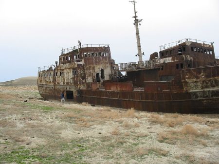 Abandoned ship on former sea. Click for bigger version. Image from: Wikipedia.